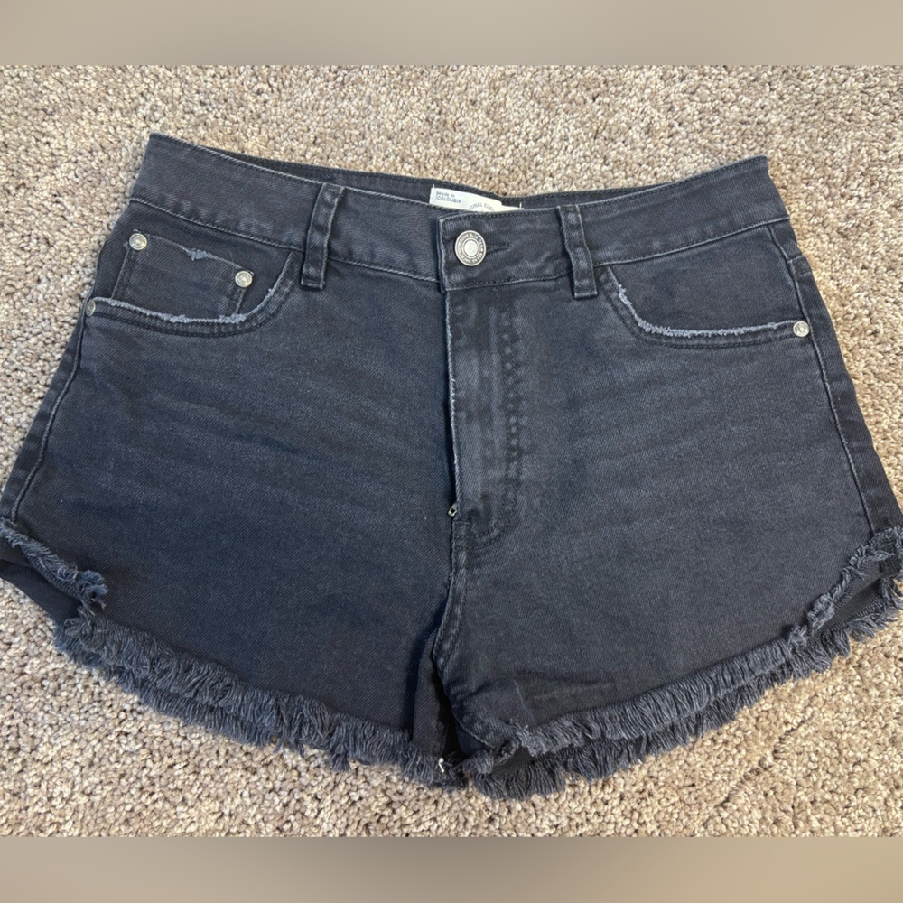 COLOR BLUE made in Colombia distressed  short in black size 6